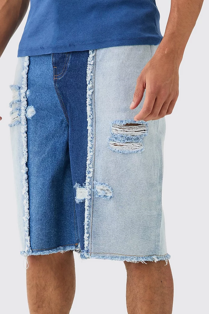 Spliced Distressed Denim Jorts In Blue | boohooMAN USA Spliced Distressed Denim Jorts In Blue | boohooMAN USA